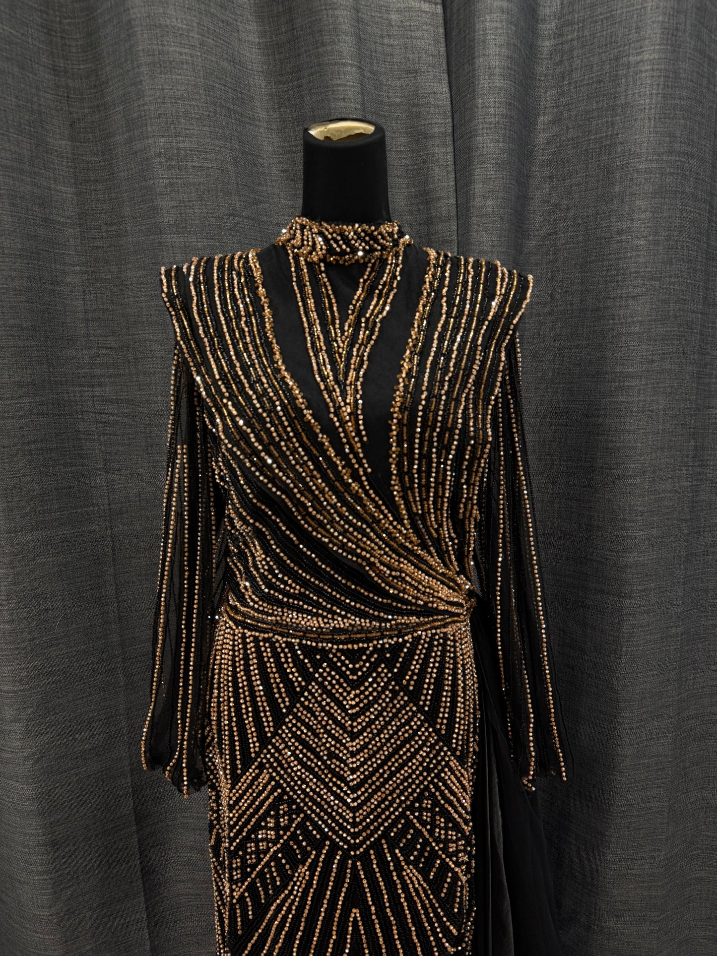 Black long sleeve dress with gold beading